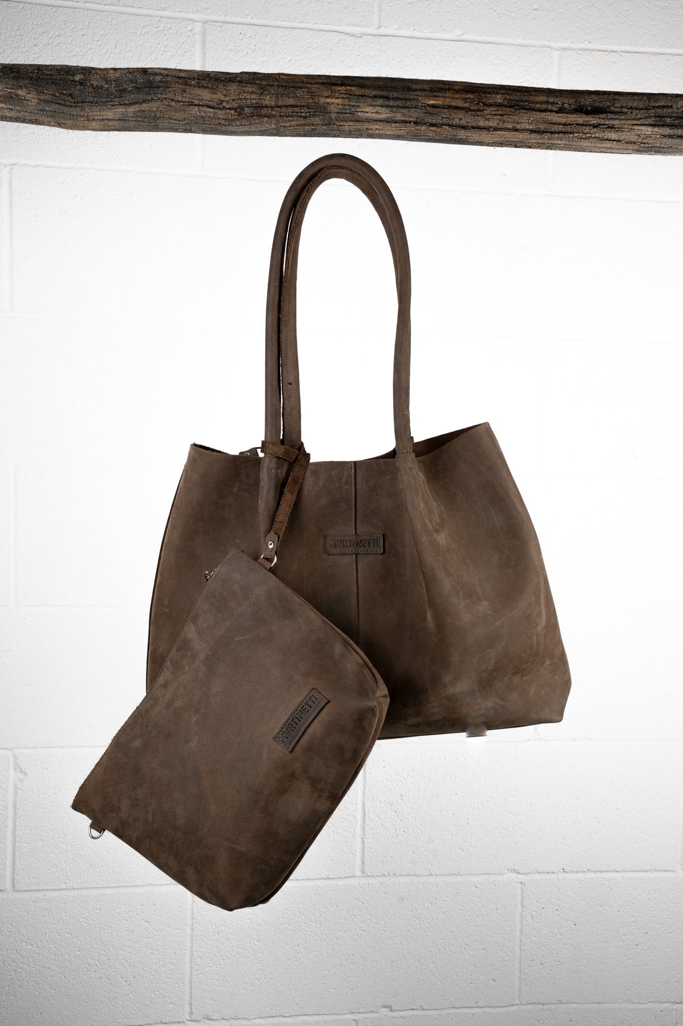 POLLY - La borsa in cuoio con pochette